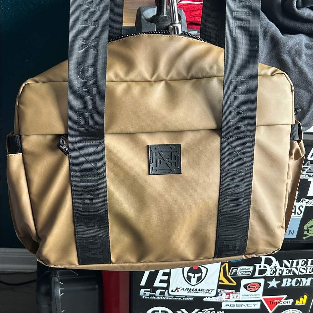 flag nor fail tan and black tote bag